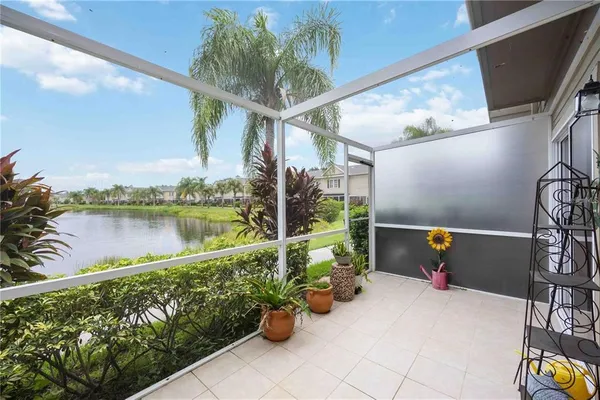 an aerial view of house with yard swimming pool and outdoor seating
