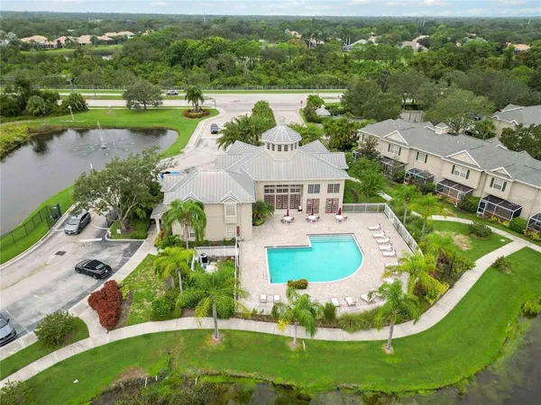 a view of outdoor space with playground and green space
