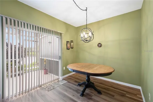 a view of a room with a table and chair