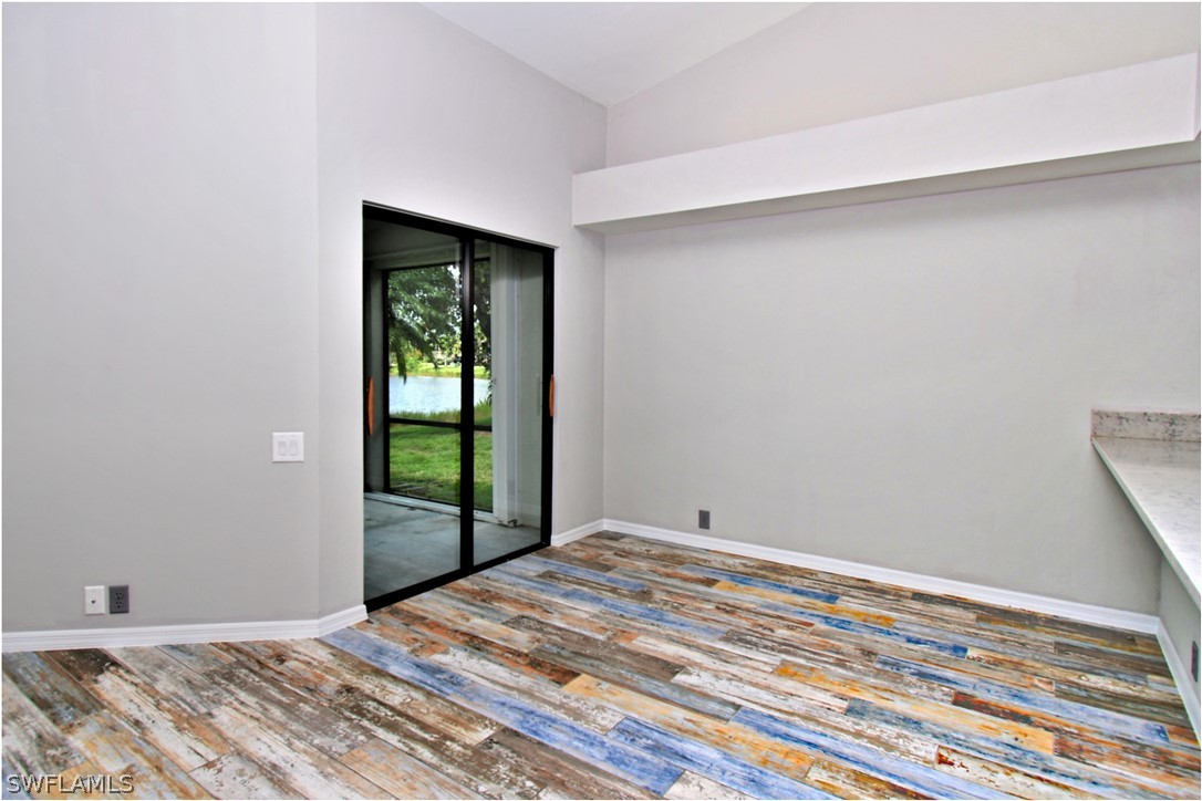 13273 Heather Ridge Loop Fort Myers, FL 33966 - Photo 11 of 21 a bedroom with a bed and a window