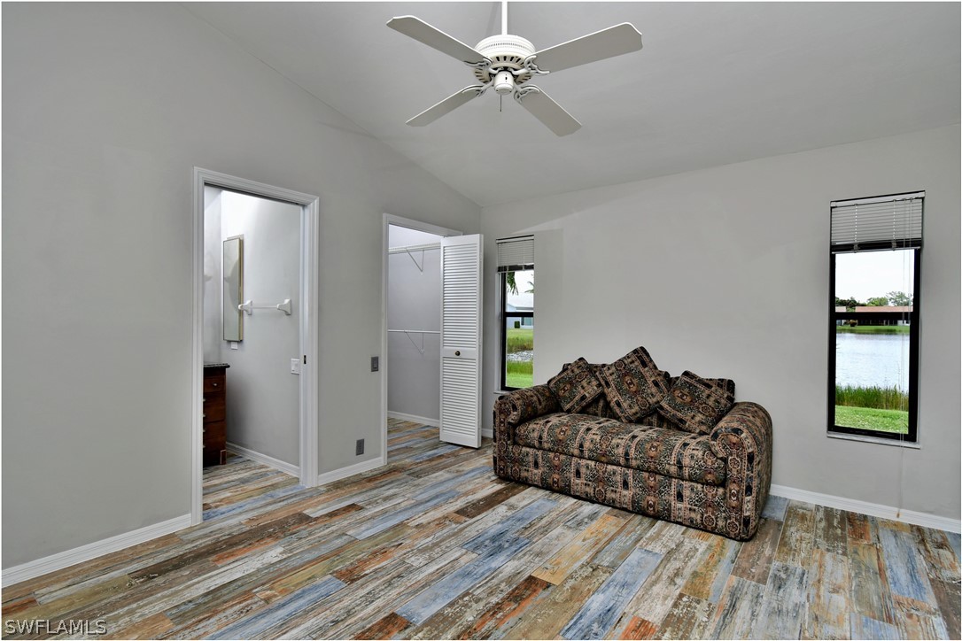 13273 Heather Ridge Loop Fort Myers, FL 33966 - Photo 12 of 21 a living room with furniture and a rug