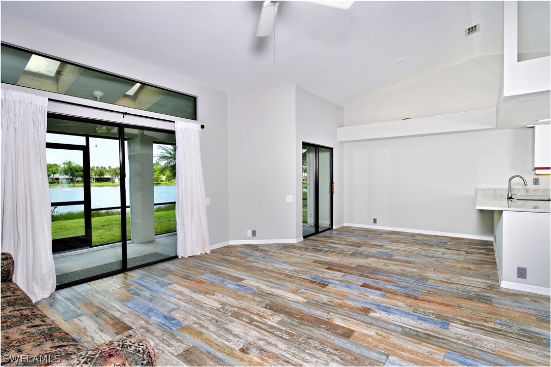 13273 Heather Ridge Loop Fort Myers, FL 33966 - Photo 8 of 21 a bedroom with a bed and a large window