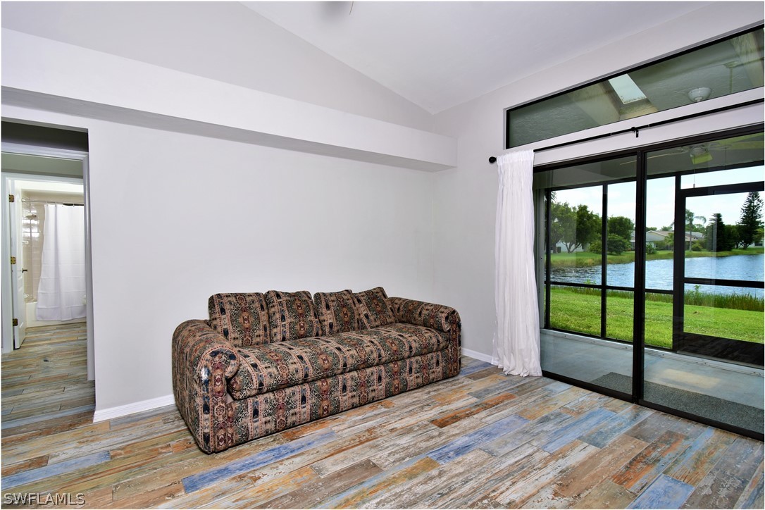 13273 Heather Ridge Loop Fort Myers, FL 33966 - Photo 10 of 21 a living room with furniture and a large window