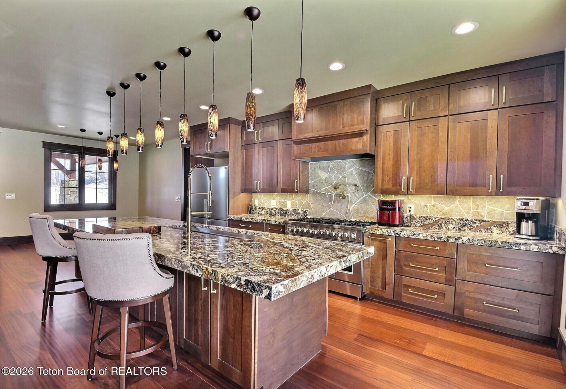 9802 Hiddenwaters Lane Victor, ID 83455 - Photo 8 of 52 Kitchen 2