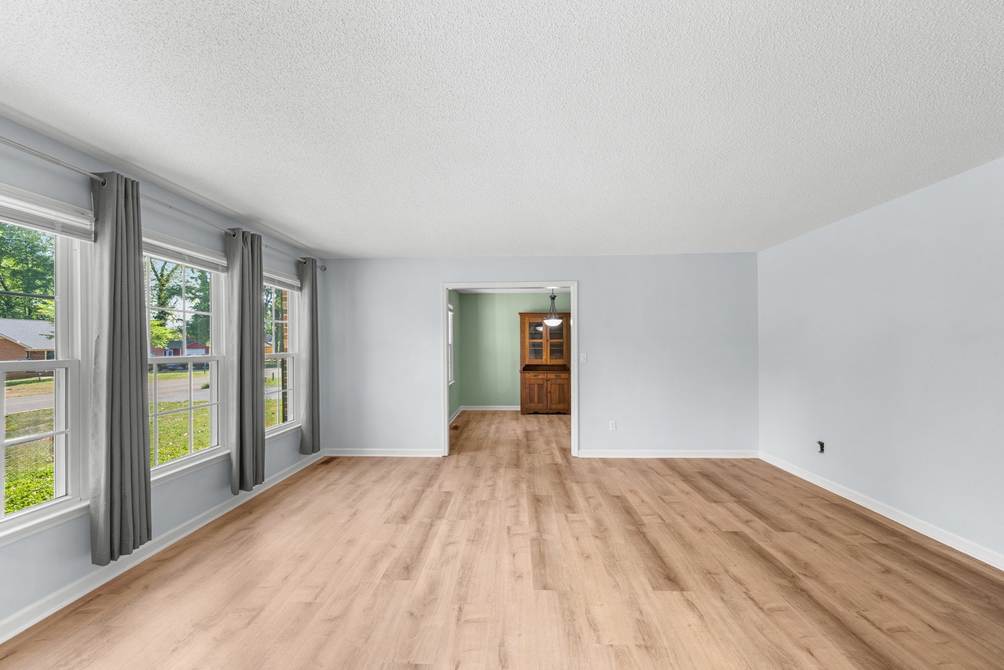 50 Maple Drive Winchester, TN 37398 - Photo 18 of 47 a view of an empty room with wooden floor and a window