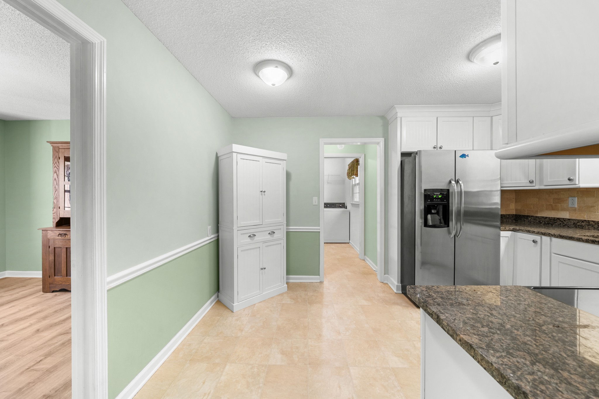 50 Maple Drive Winchester, TN 37398 - Photo 23 of 47 a kitchen with stainless steel appliances granite countertop a refrigerator and a sink