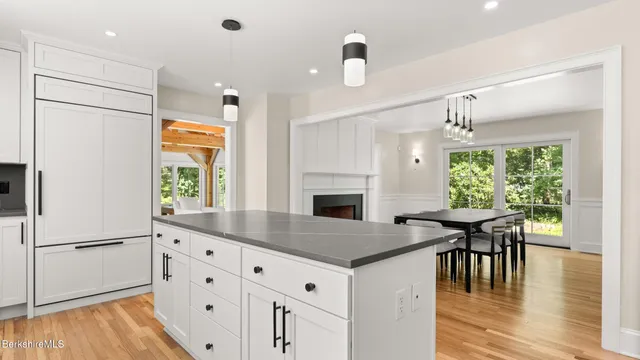 a dining room with furniture window wooden floor