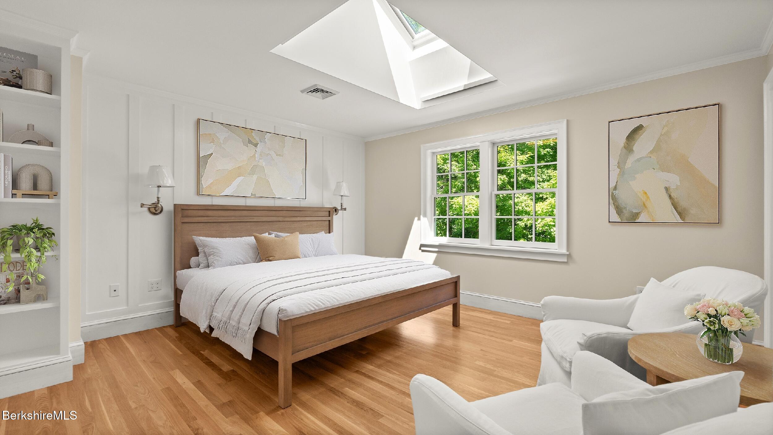 55 Main Street Stockbridge, MA 01262 - Photo 28 of 54 a bedroom with a bed and wooden floor