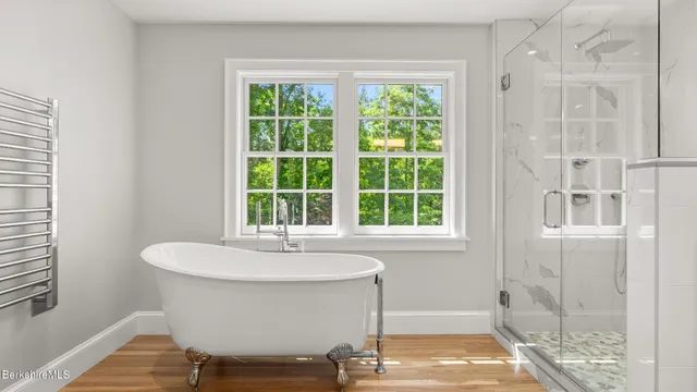 a bathroom with a sink and a large mirror