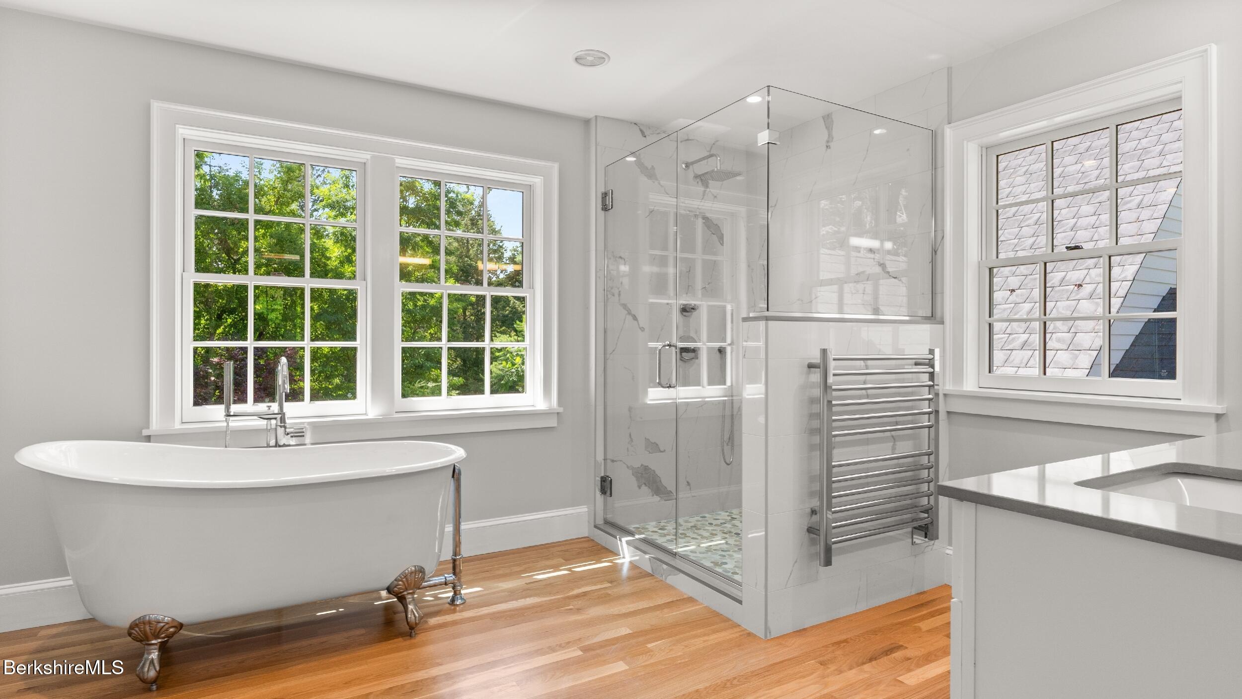 55 Main Street Stockbridge, MA 01262 - Photo 33 of 54 a bathroom with a sink and a large mirror