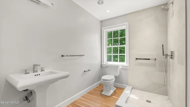 a kitchen with a sink a refrigerator and window