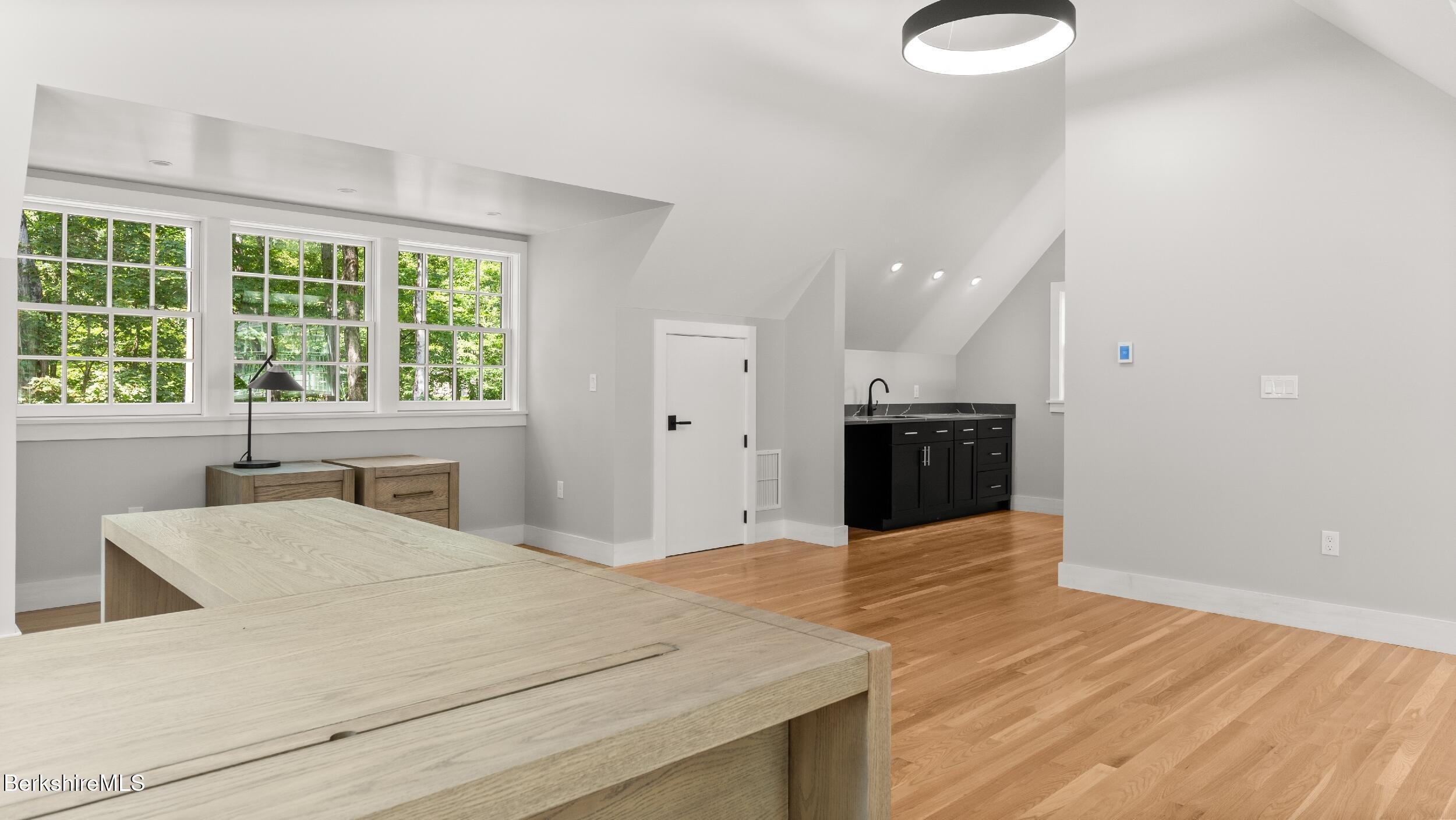 55 Main Street Stockbridge, MA 01262 - Photo 38 of 54 a large white bed in a white room