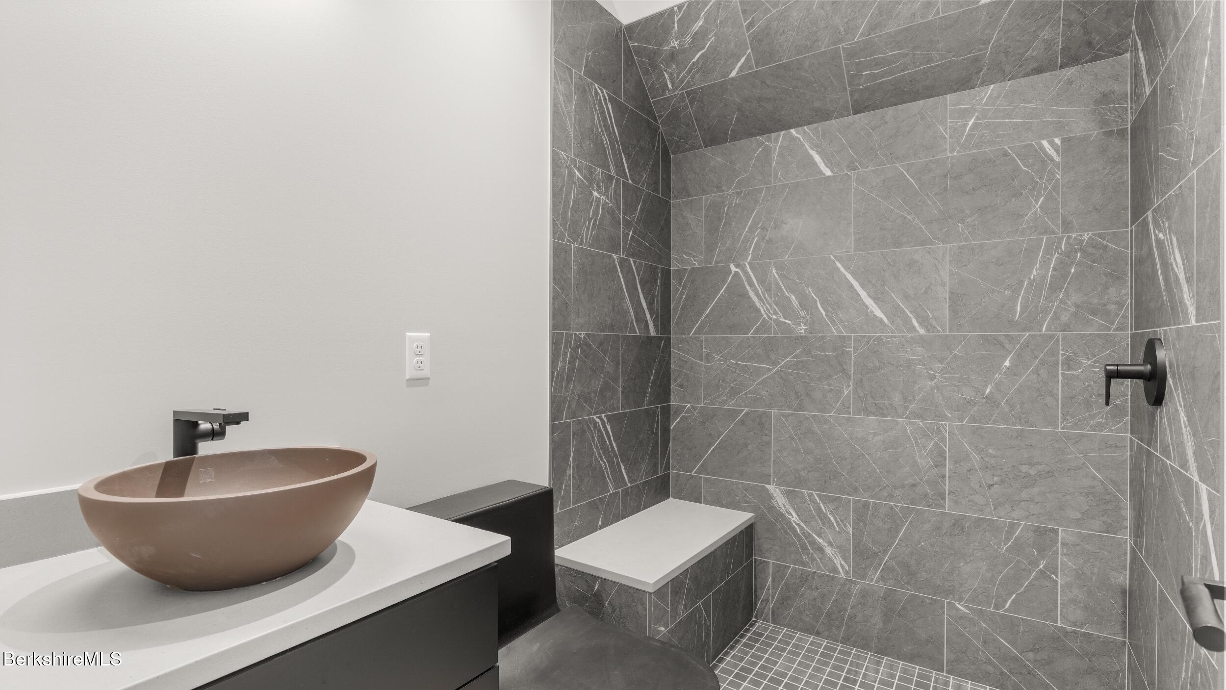 55 Main Street Stockbridge, MA 01262 - Photo 41 of 54 a bathroom with a toilet and a sink