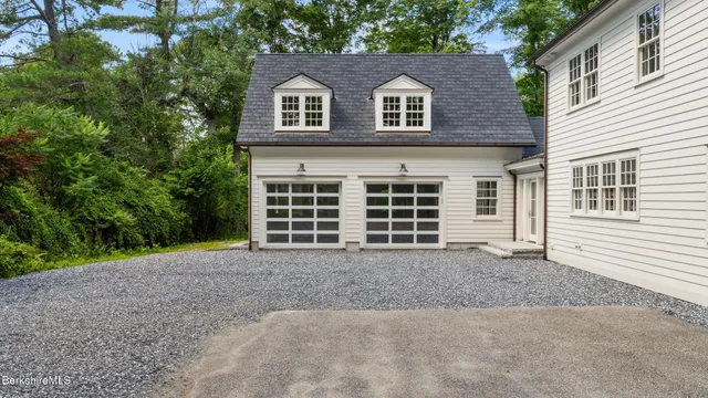 front view of a house with a trees