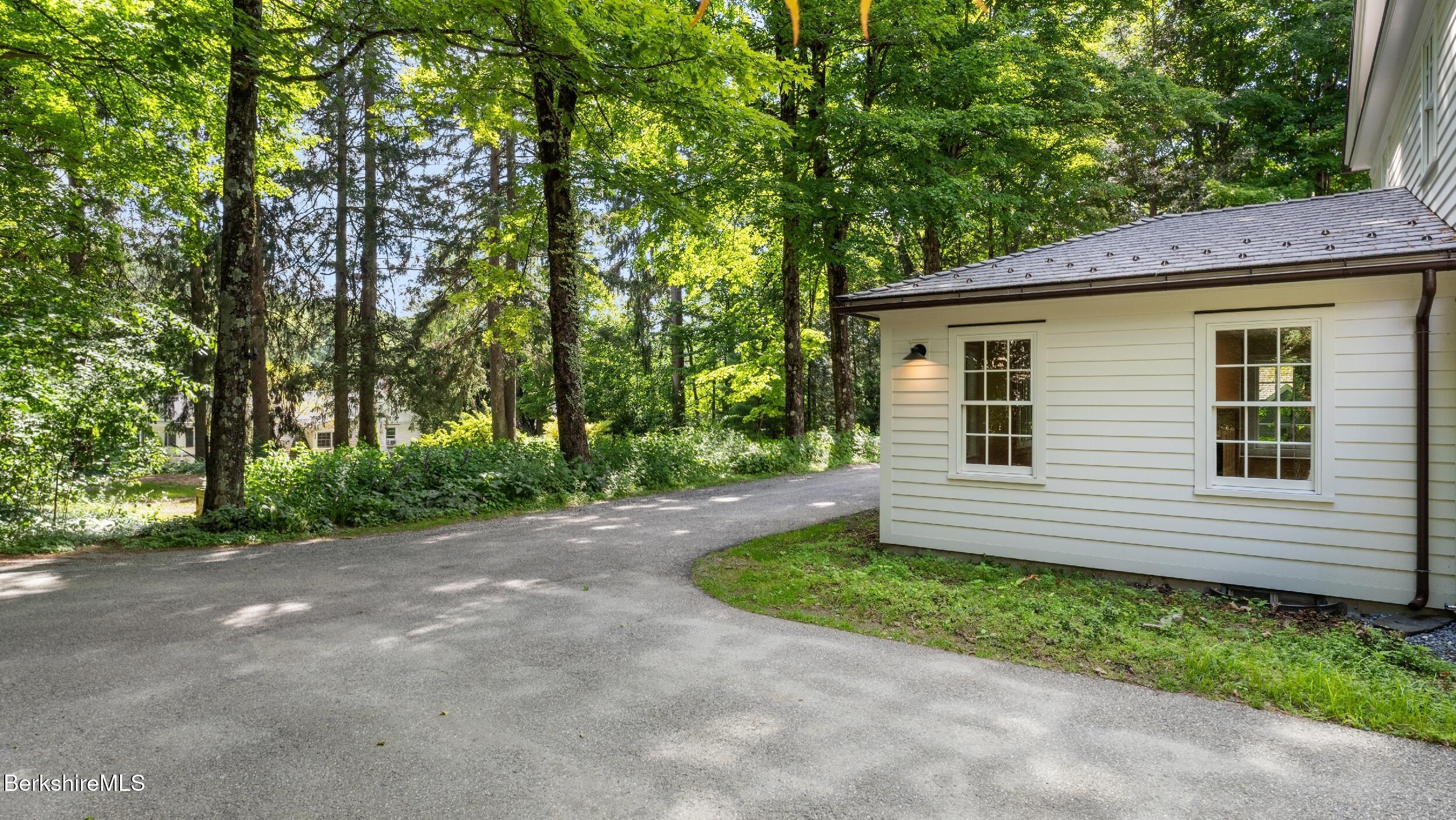 55 Main Street Stockbridge, MA 01262 - Photo 46 of 54 a view of a house with a backyard