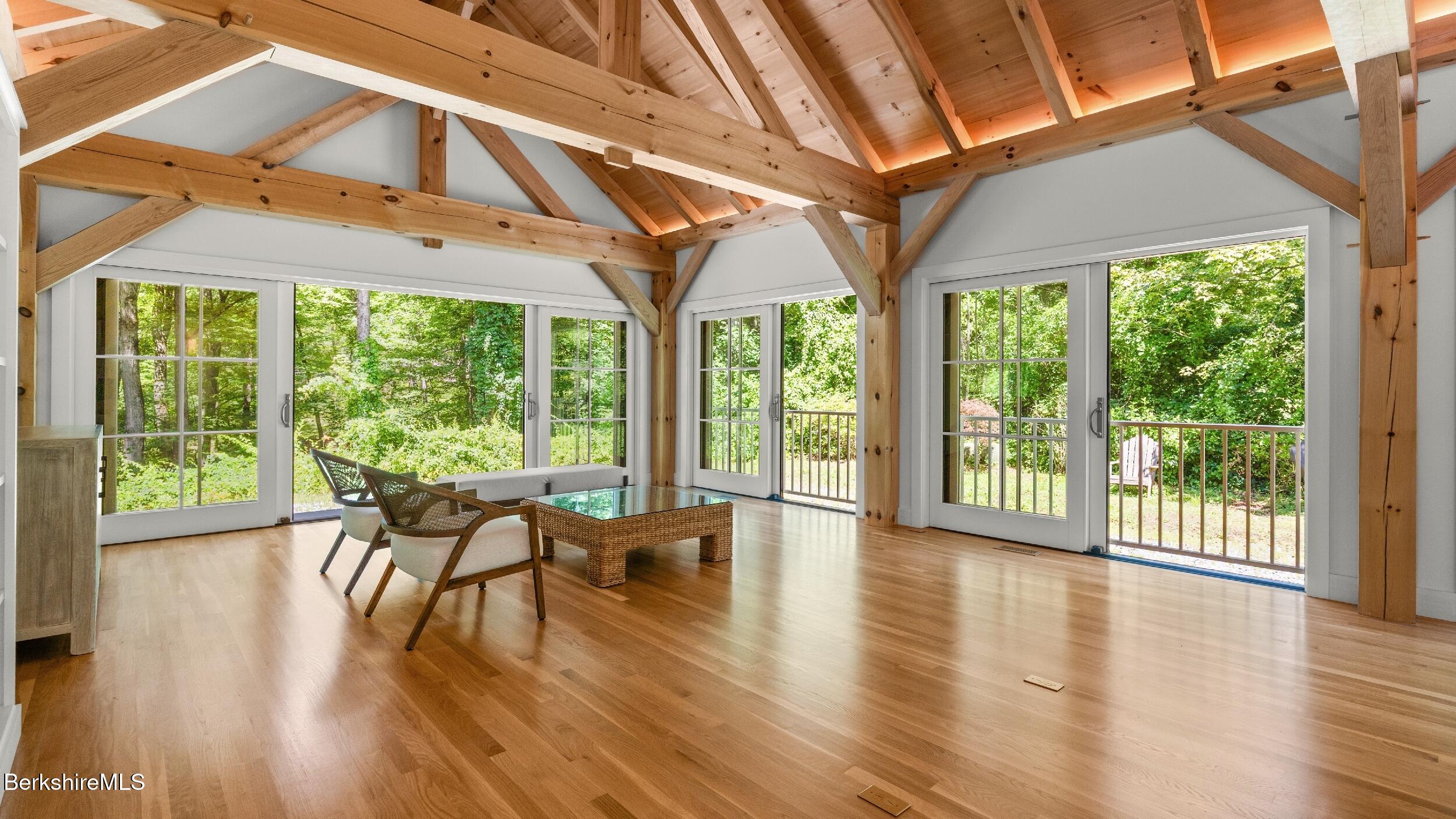 55 Main Street Stockbridge, MA 01262 - Photo 7 of 54 a dining room with wooden floor outdoor seating and nature