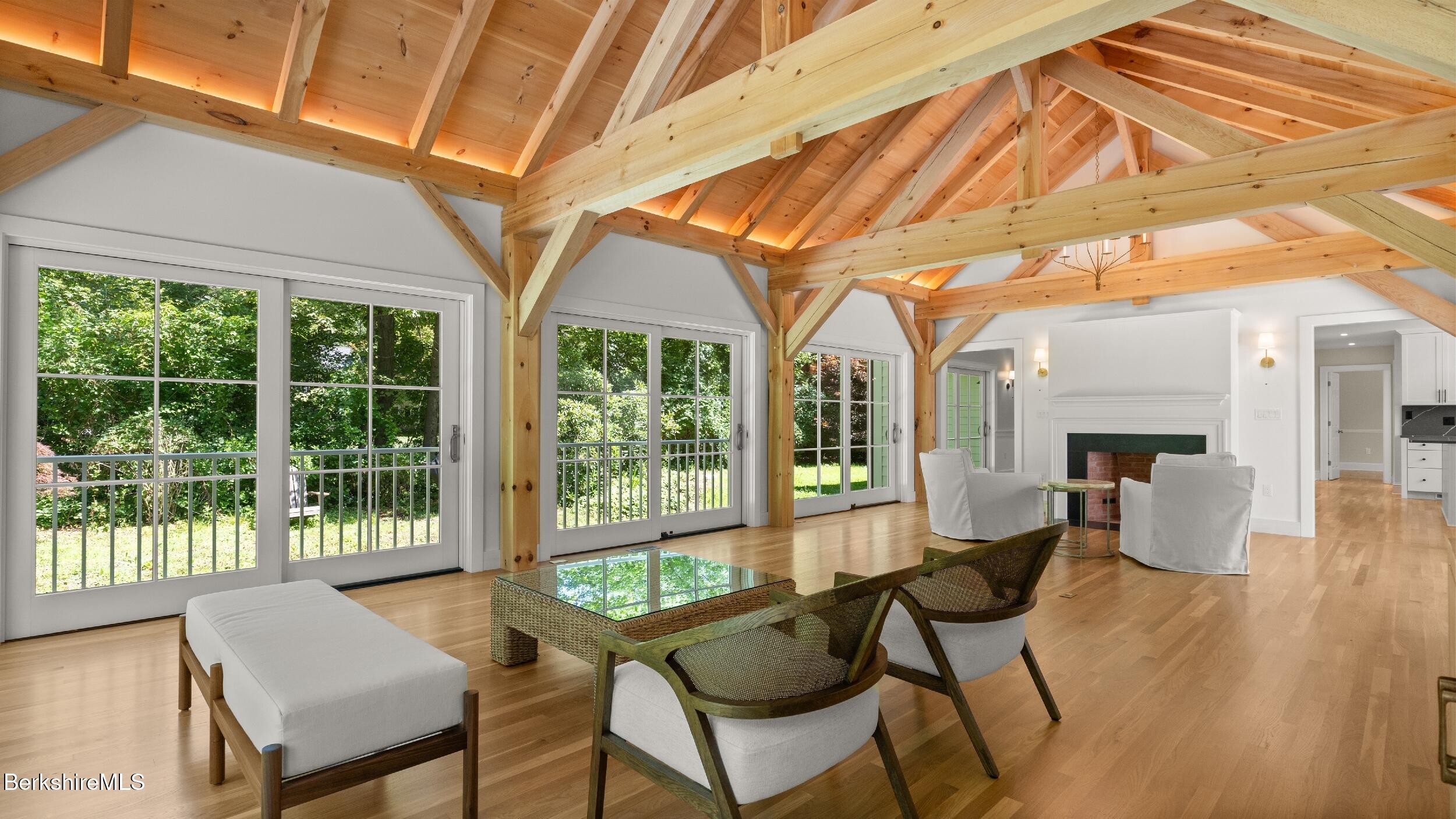 55 Main Street Stockbridge, MA 01262 - Photo 8 of 54 a living room with furniture and a floor to ceiling window