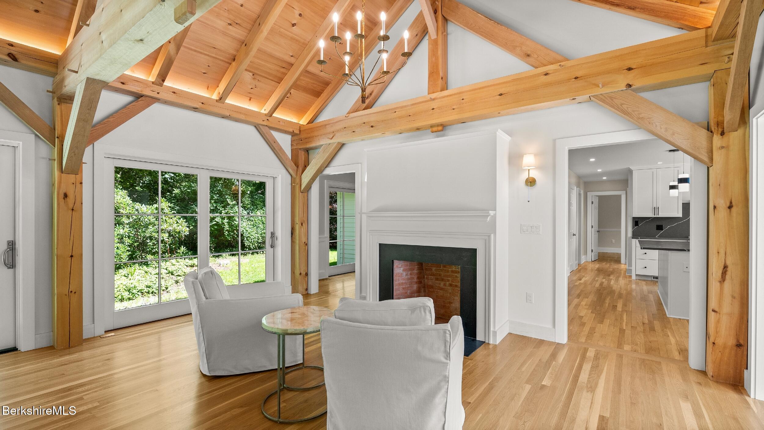 55 Main Street Stockbridge, MA 01262 - Photo 10 of 54 a living room with furniture and a fireplace