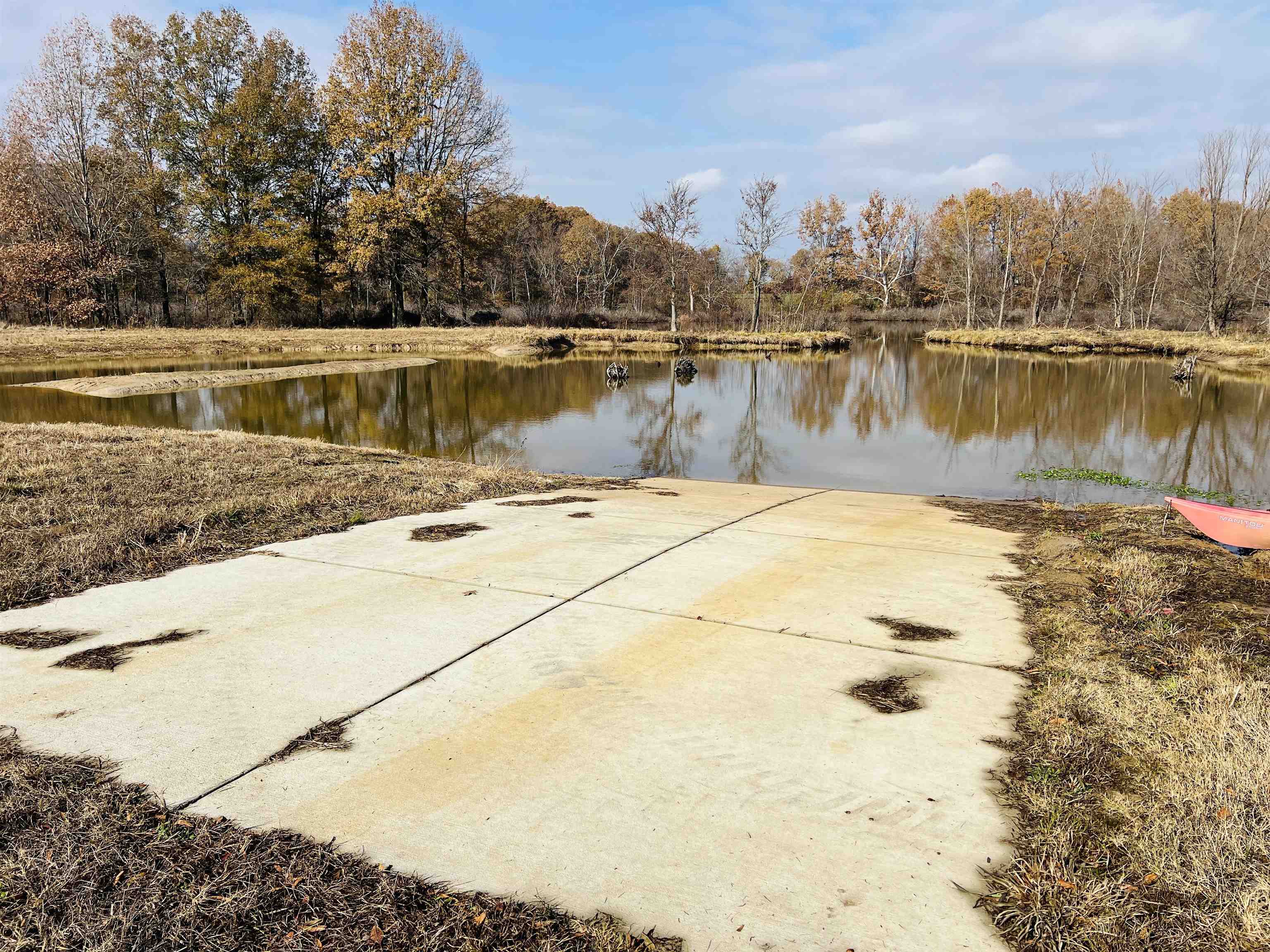 400 Teague Store Road Somerville, TN 38068 - Photo 16 of 40 a view of a lake with houses in the back