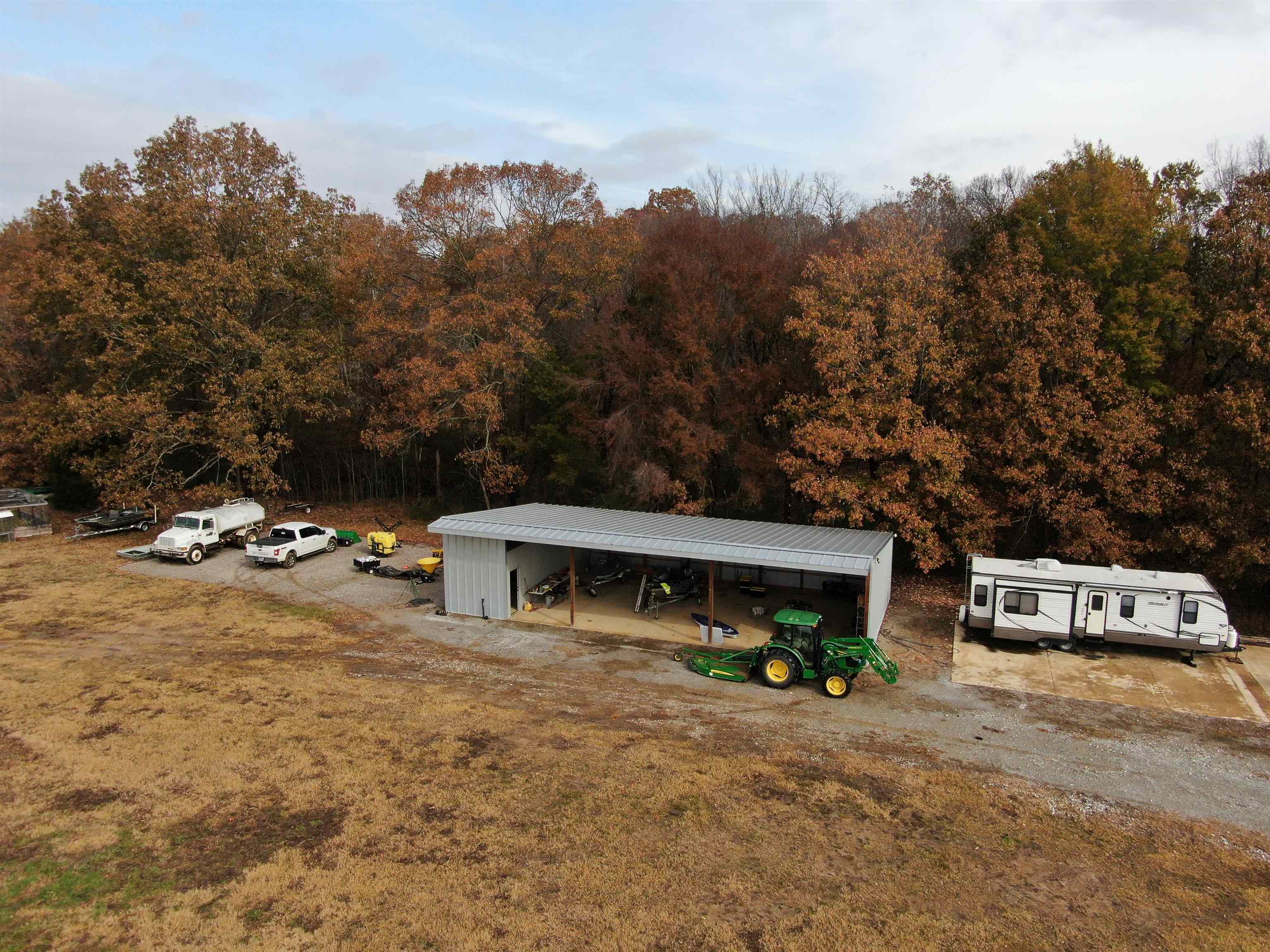 400 Teague Store Road Somerville, TN 38068 - Photo 6 of 40 a view of a house with a patio