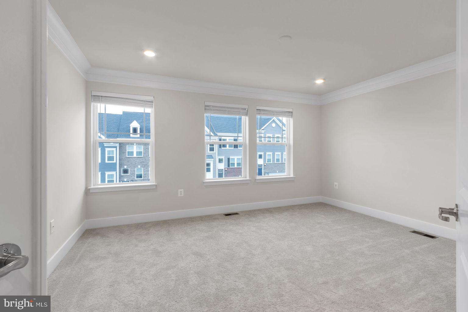 2216 Partin Road Windsor Mill, MD 21244 - Photo 13 of 25 an empty room with windows