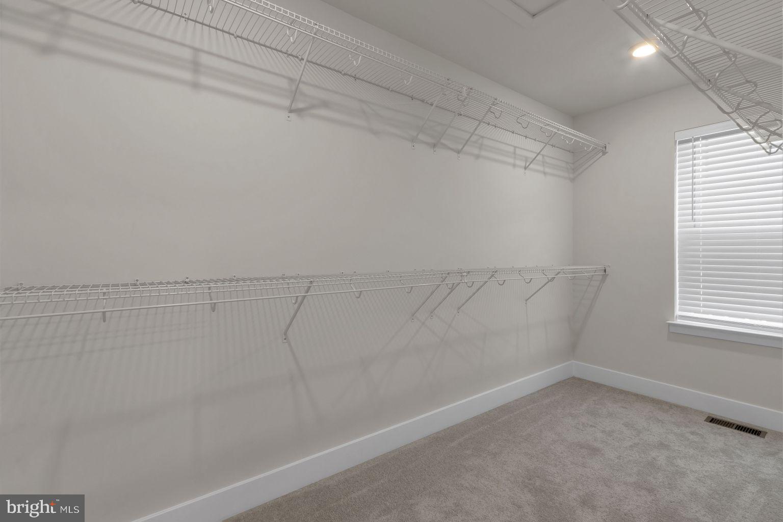 2216 Partin Road Windsor Mill, MD 21244 - Photo 15 of 25 a view of a room with racks on the wall