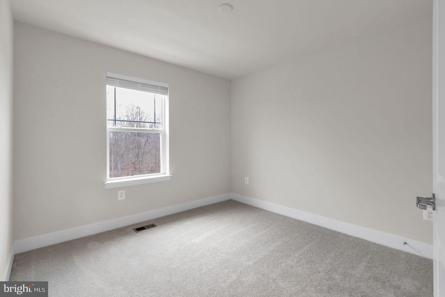 2216 Partin Road Windsor Mill, MD 21244 - Photo 19 of 25 an empty room with windows