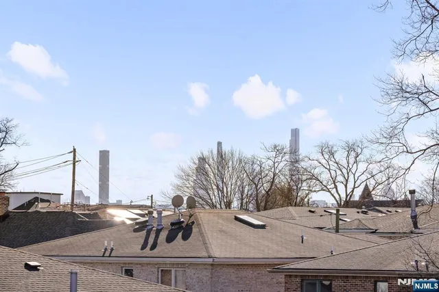 a view of a city with tall buildings