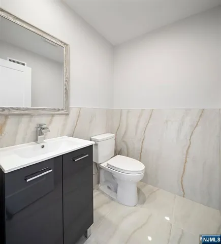 a bathroom with a sink and a toilet