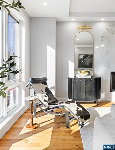 a living room with a couch and a flat screen tv