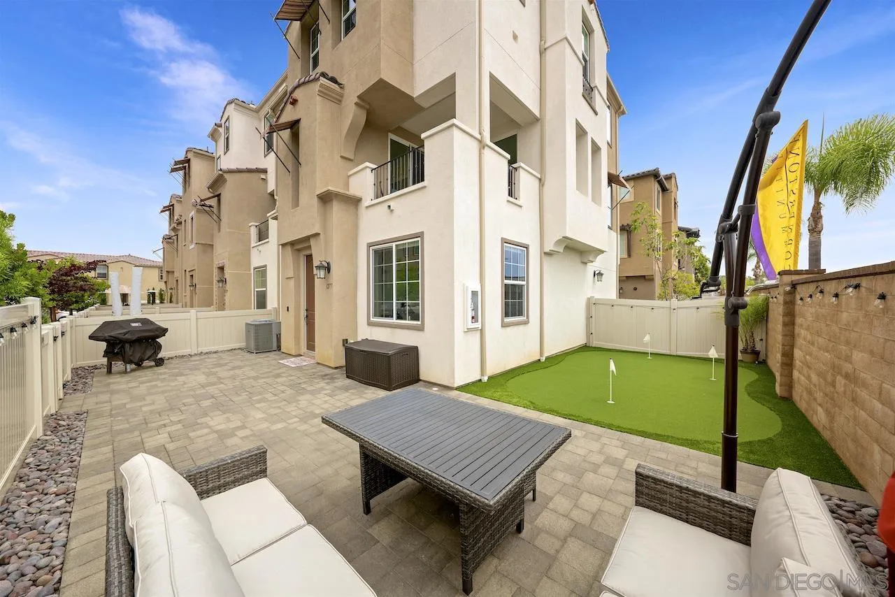 a view of a building with backyard