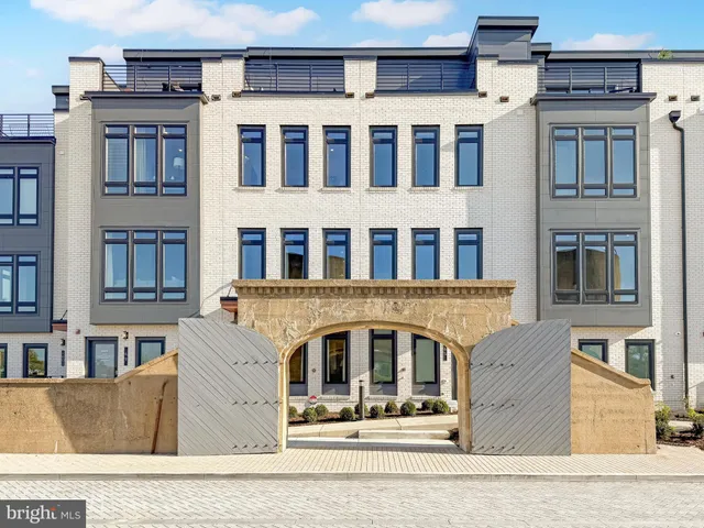 a front view of a building with glass windows