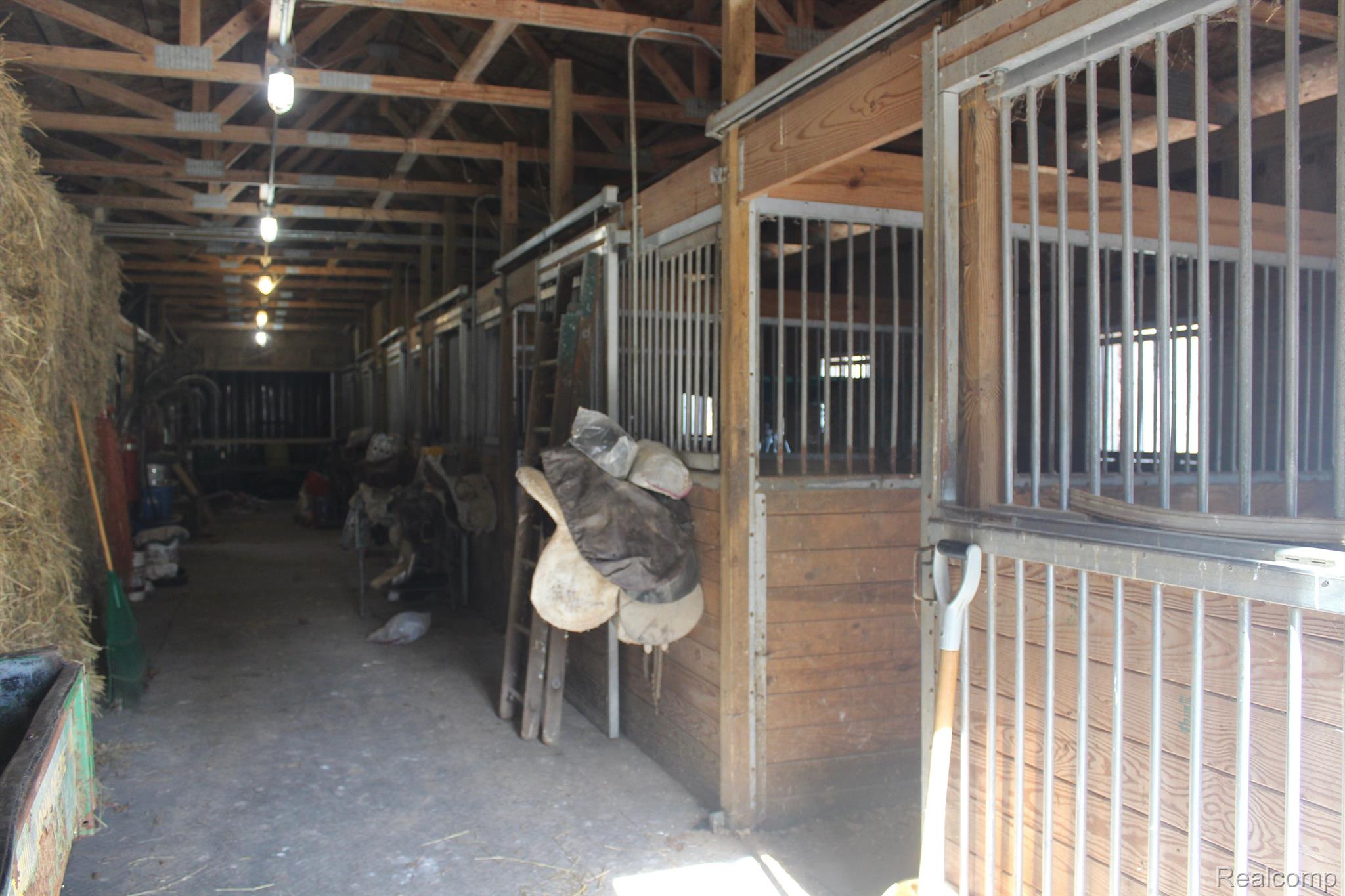 6875 Farley Road Pinckney, MI 48169 - Photo 43 of 53 6 stalls in barn