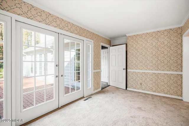 an empty room with windows