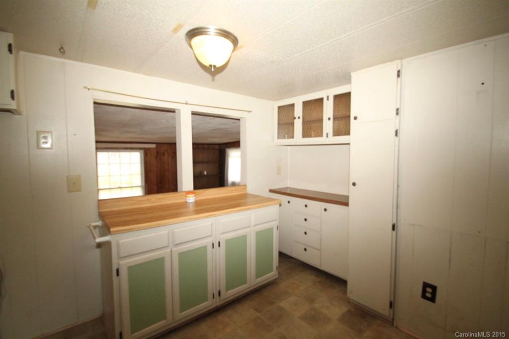 5 Mountain Mission Road Clyde, NC 28721 - Photo 13 of 23 a utility room with a washer and dryer