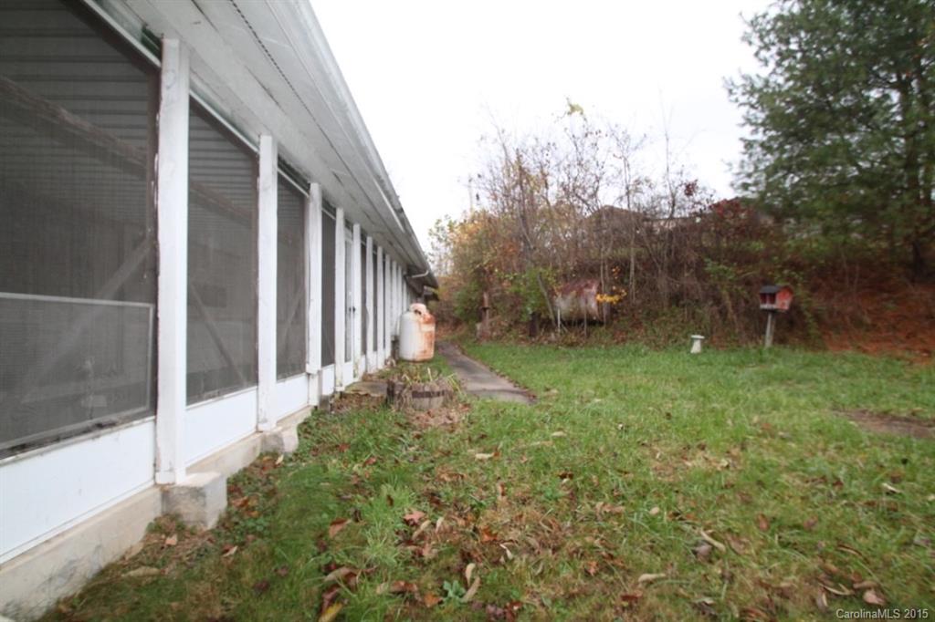 5 Mountain Mission Road Clyde, NC 28721 - Photo 22 of 23 a backyard of a house with lots of green space