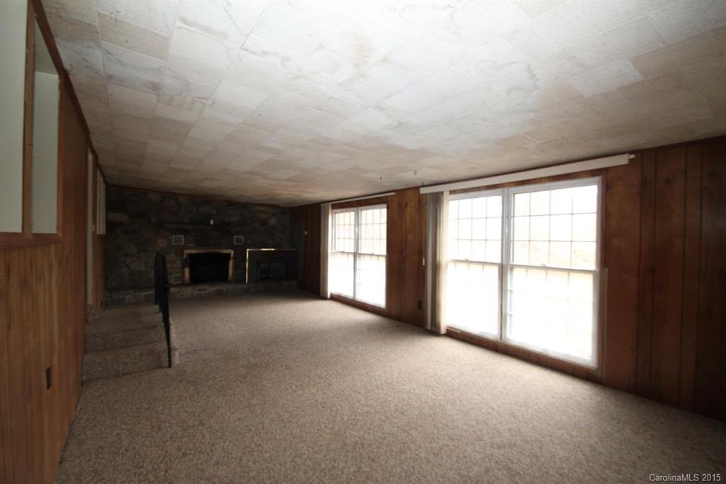 5 Mountain Mission Road Clyde, NC 28721 - Photo 6 of 23 a view of empty room with a fireplace