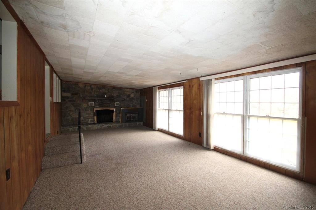 5 Mountain Mission Road Clyde, NC 28721 - Photo 7 of 23 a view of empty room with windows