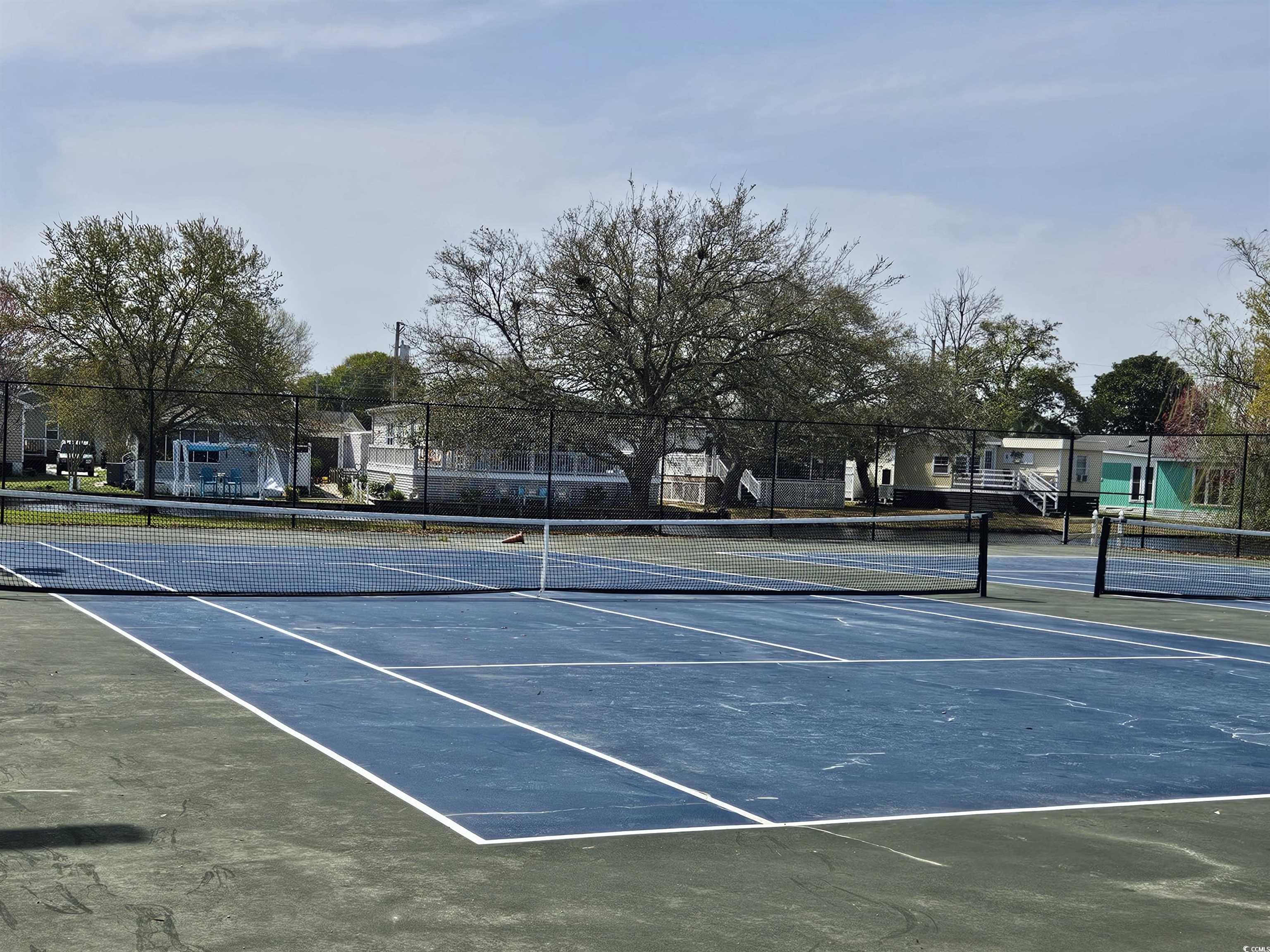 355 Meadowlark Surfside Beach, SC 29575 - Photo 31 of 39 View of tennis court featuring community basketball court