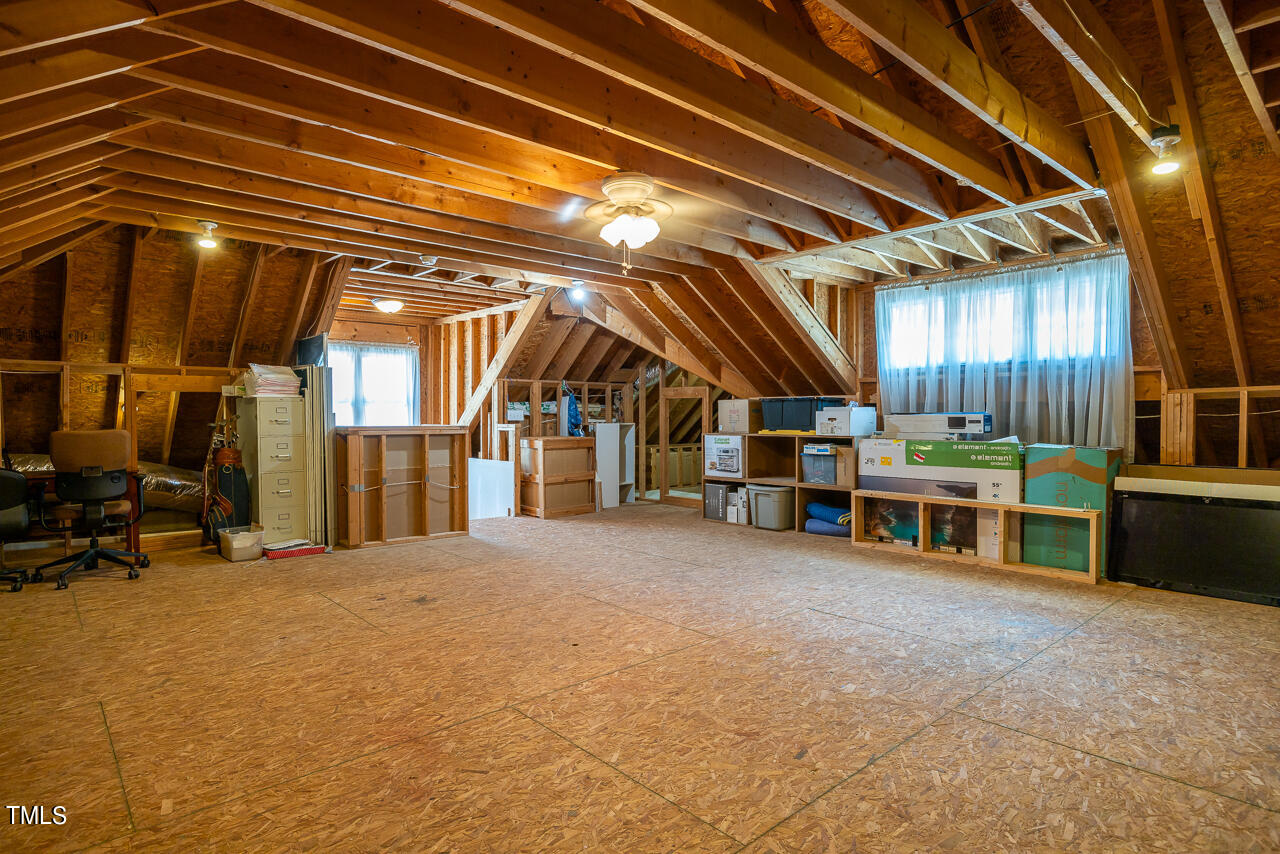 7353 Newport Avenue Raleigh, NC 27613 - Photo 41 of 51 Unfinished Attic Storage