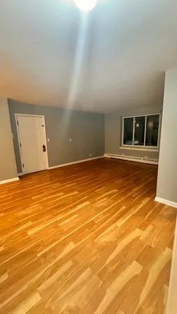 a view of empty room with windows
