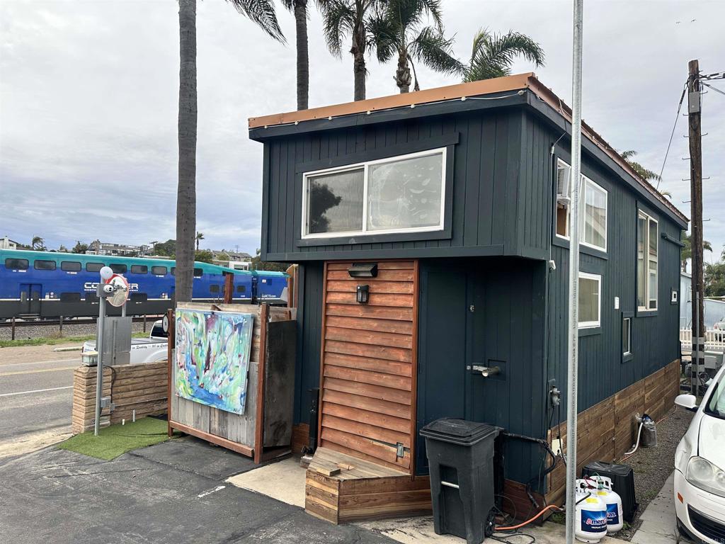 1549 North Vulcan Avenue, Unit 1 Encinitas, CA 92024 - Photo 2 of 21 a view of a house with a balcony