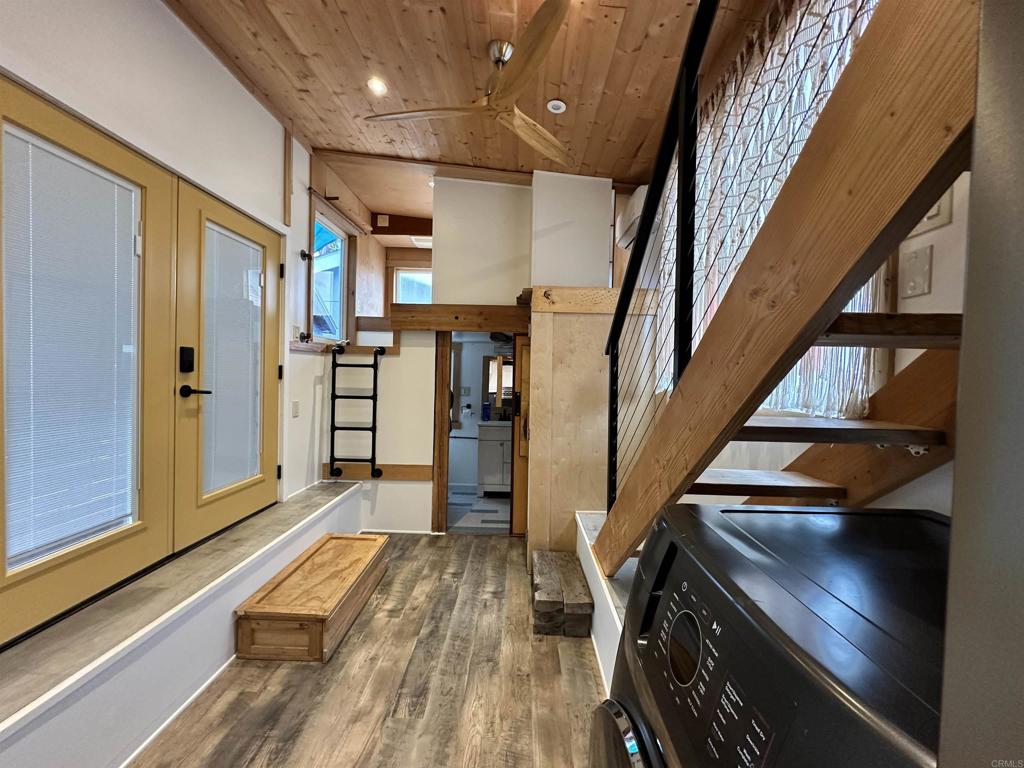 1549 North Vulcan Avenue, Unit 1 Encinitas, CA 92024 - Photo 9 of 21 a view of entryway and hall with wooden floor
