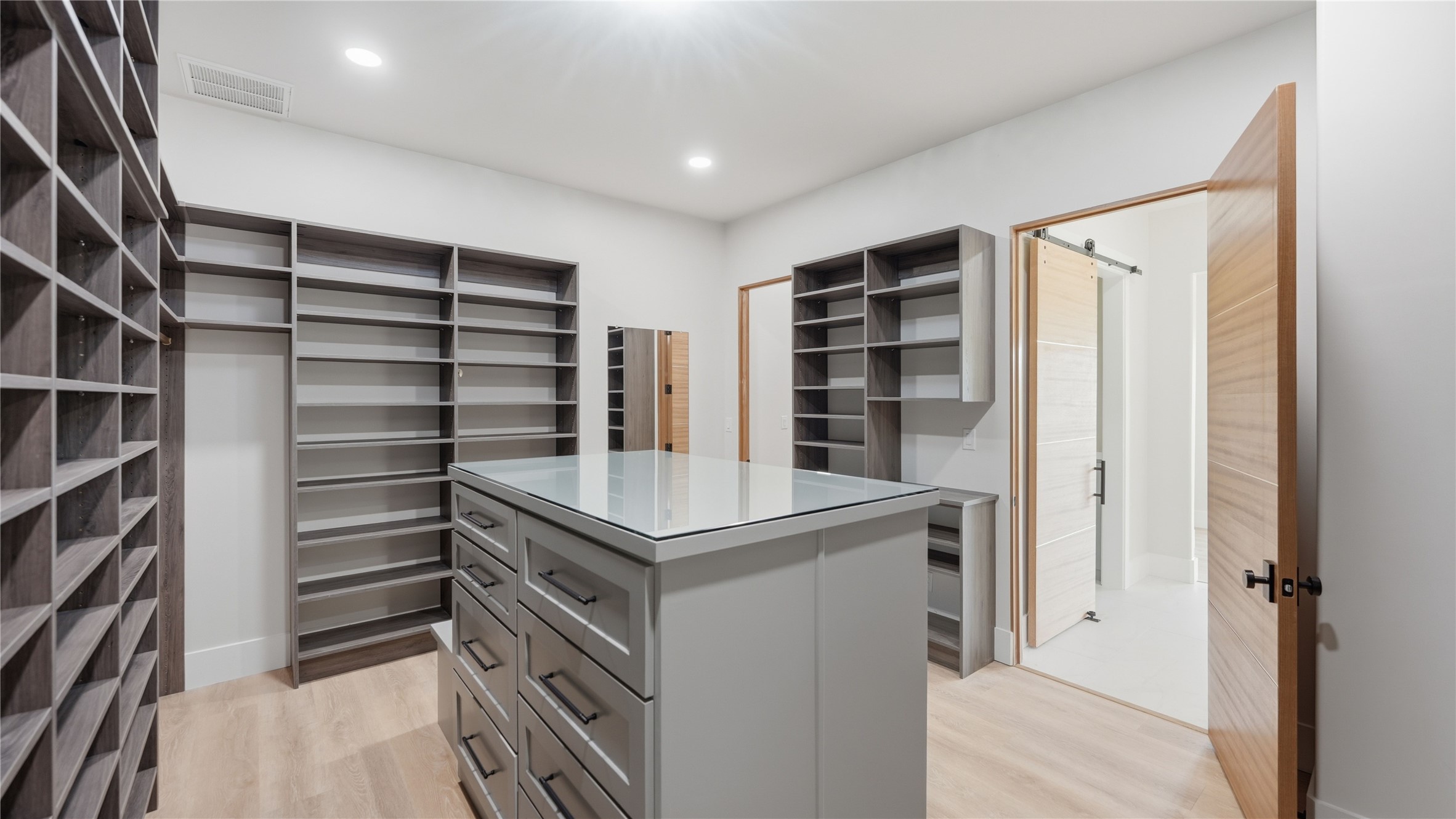 447 County Road 2211 Rusk, TX 75785 - Photo 41 of 50 a view of walk in closet with empty racks