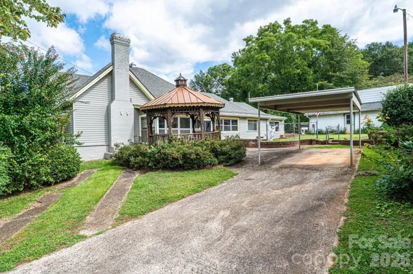 a view of entryway with a table and chairs