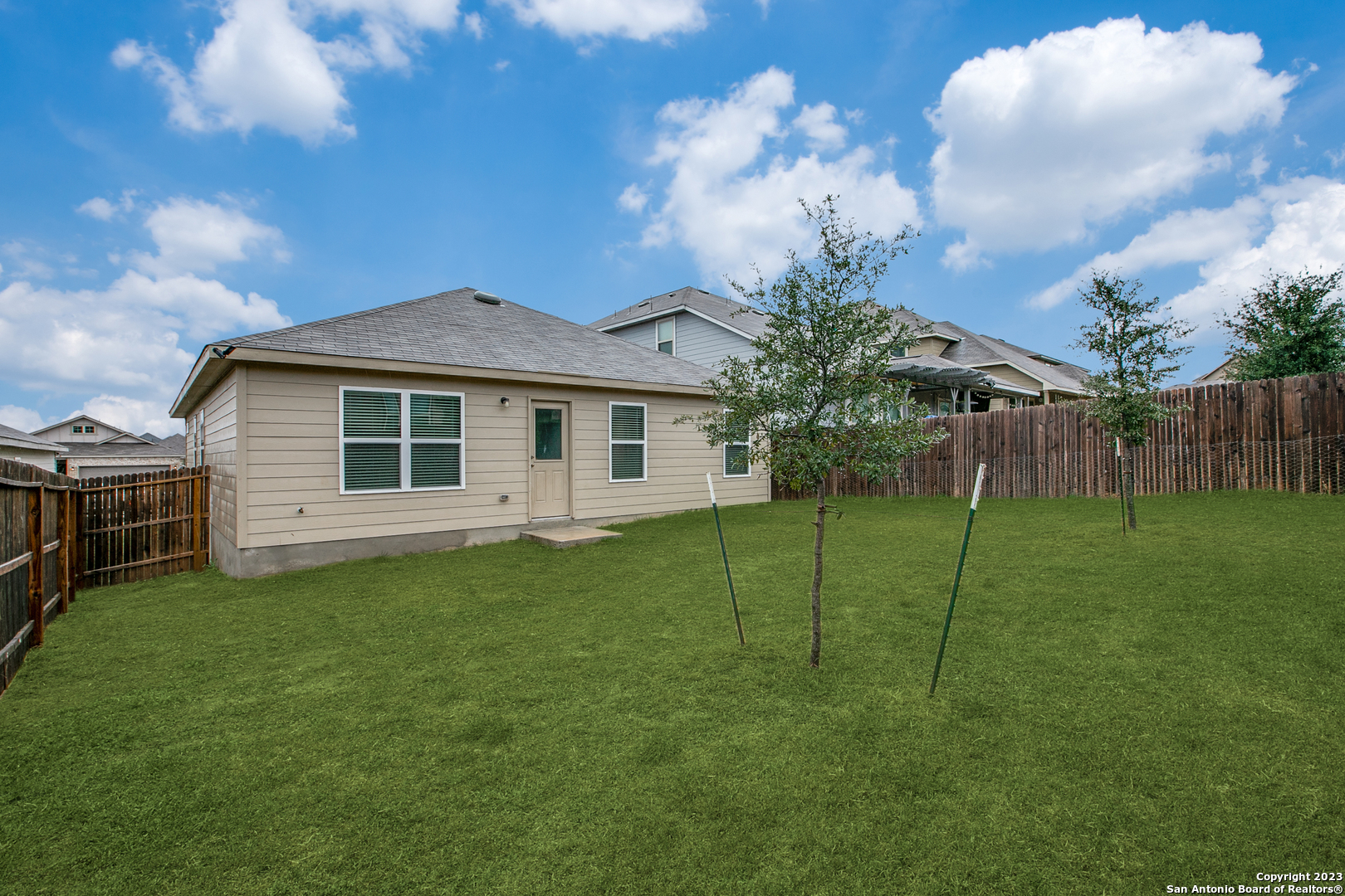 2025 Rhesus View San Antonio, TX 78245 - Photo 13 of 13 a view of a house with backyard