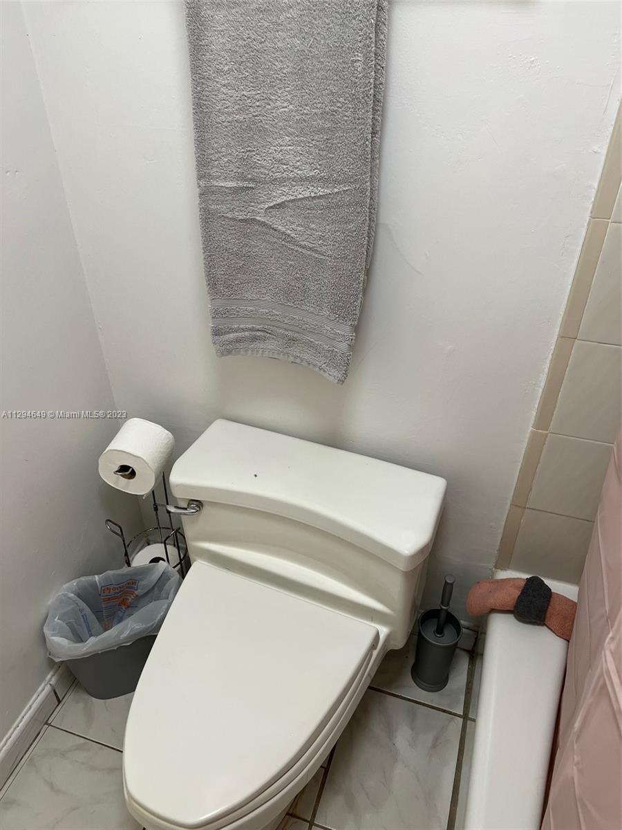 100 Lincoln Road, Unit 1001 Miami Beach, FL 33139 - Photo 21 of 62 a bathroom with a toilet and a sink