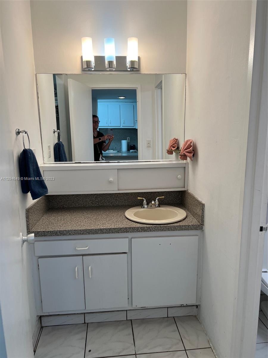 100 Lincoln Road, Unit 1001 Miami Beach, FL 33139 - Photo 22 of 62 a view of living room with cabinets and washer