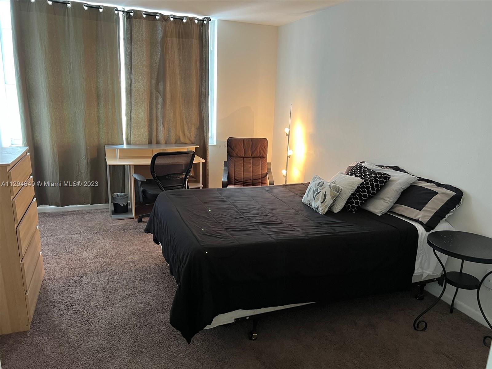 100 Lincoln Road, Unit 1001 Miami Beach, FL 33139 - Photo 10 of 62 a bedroom with a bed and a window