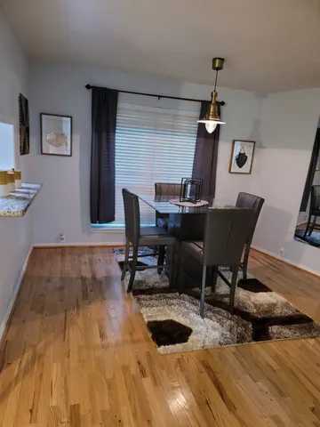 a view of a workspace with furniture